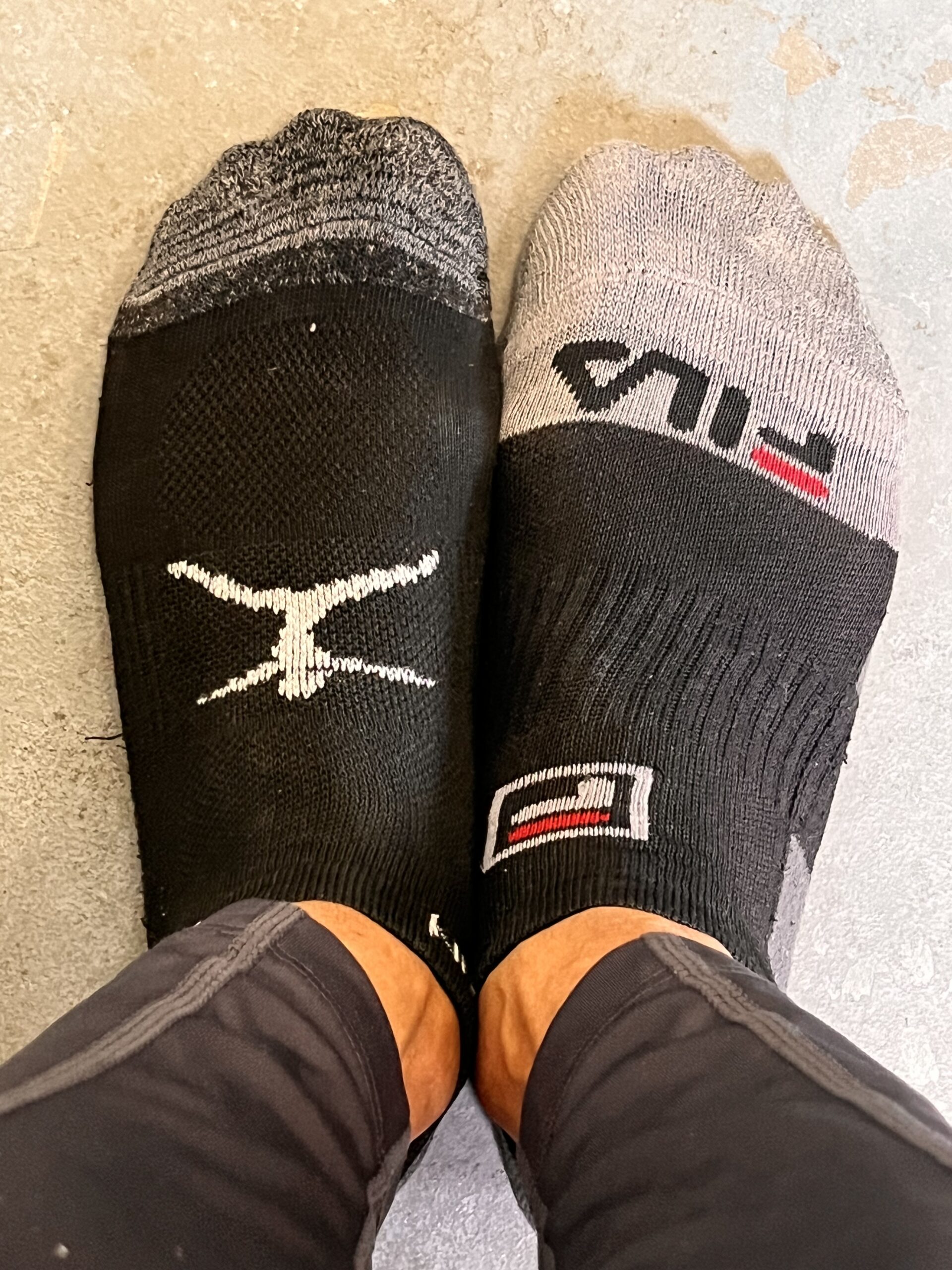 Pictured are two socks that don't match.